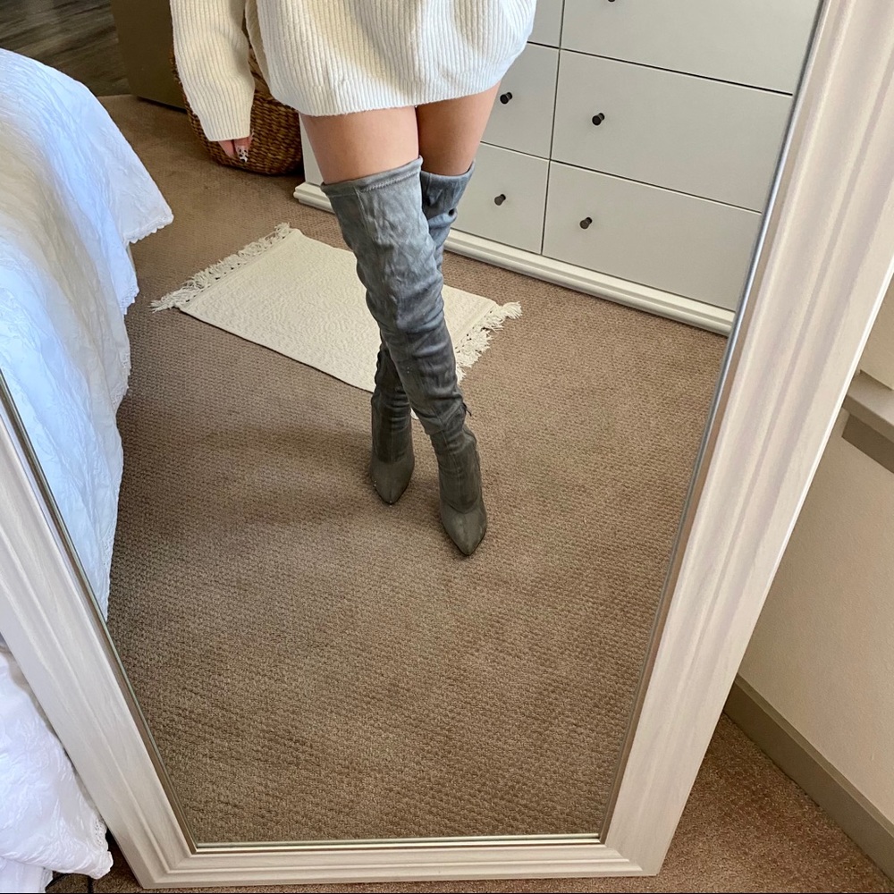 Grey over the knee high heel boots.